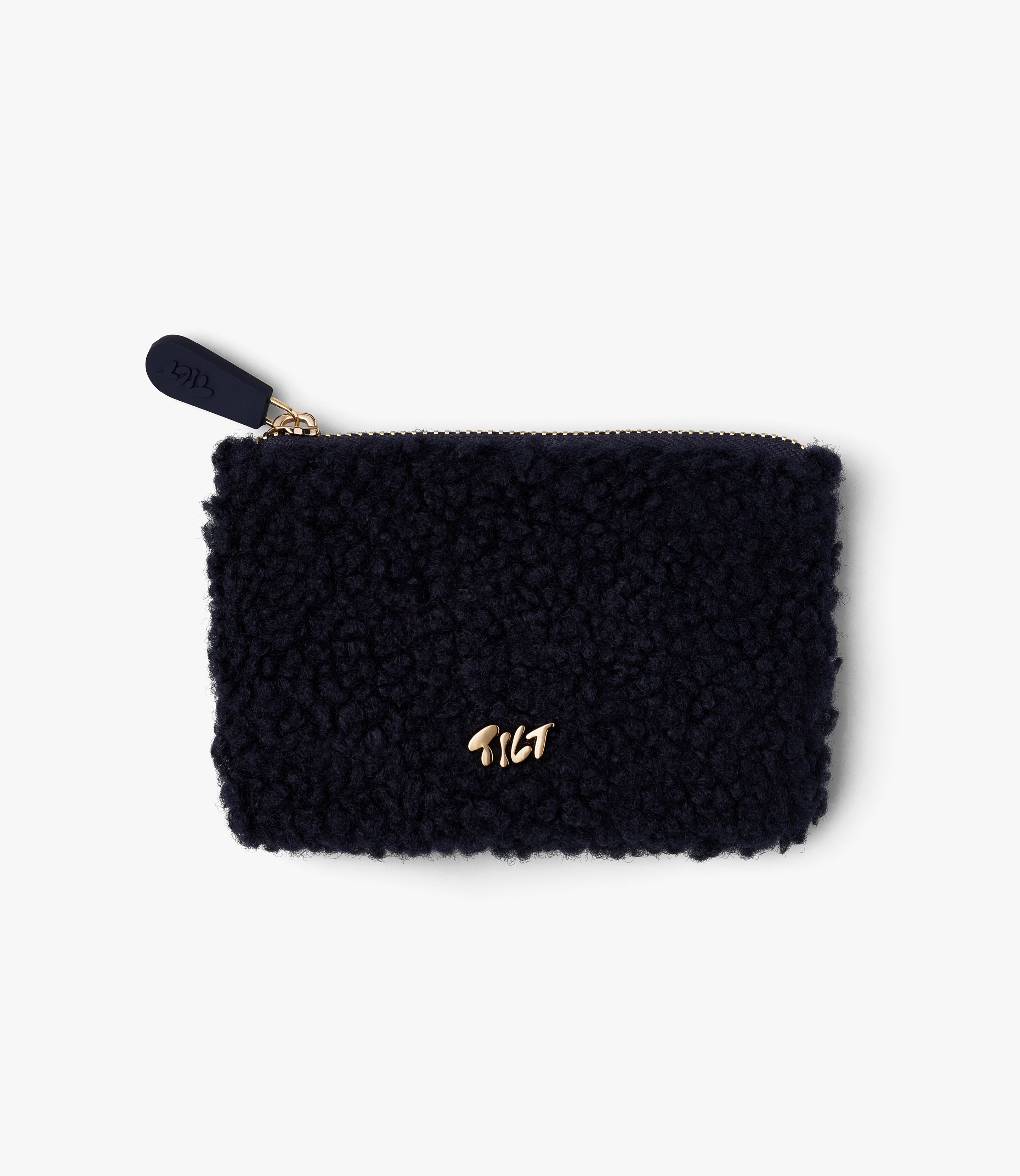 Small dark navy sherpa pouch with gold hardware and rubberized zipper pull