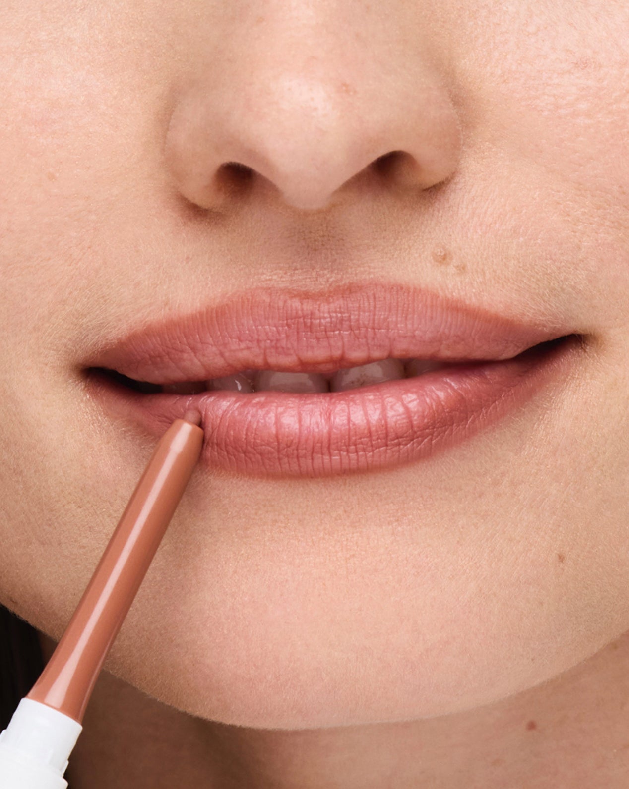 The Essentials Edit - Lip Balm, Lip Liner, Lipstick, and Mascara + FREE Clutch