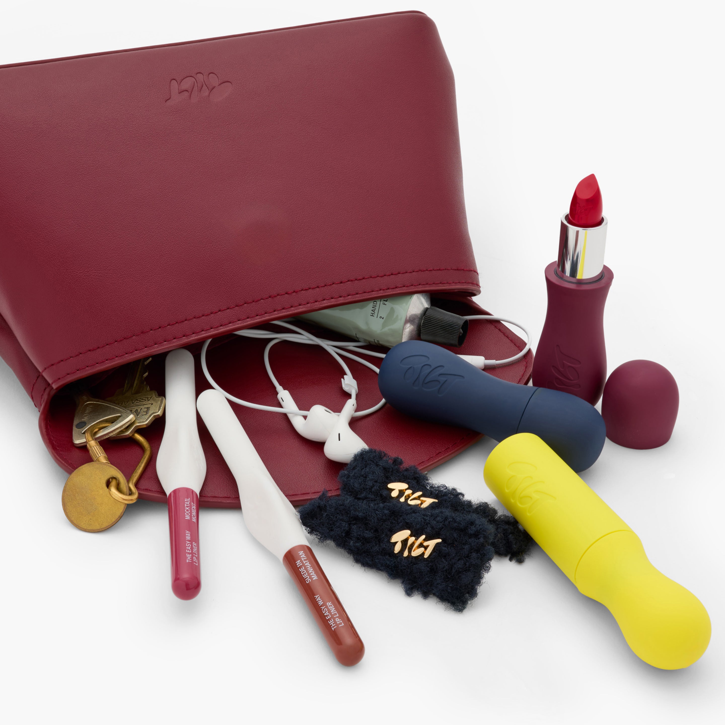 The Essentials Edit - Lip Balm, Lip Liner, Lipstick, and Mascara + FREE Clutch